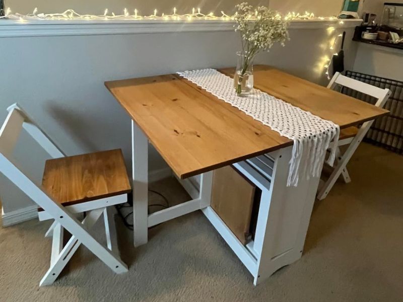 Foto de cliente de Conjunto Mesa y 4 Sillas Plegables Belisim Color Blanco Mate y Roble