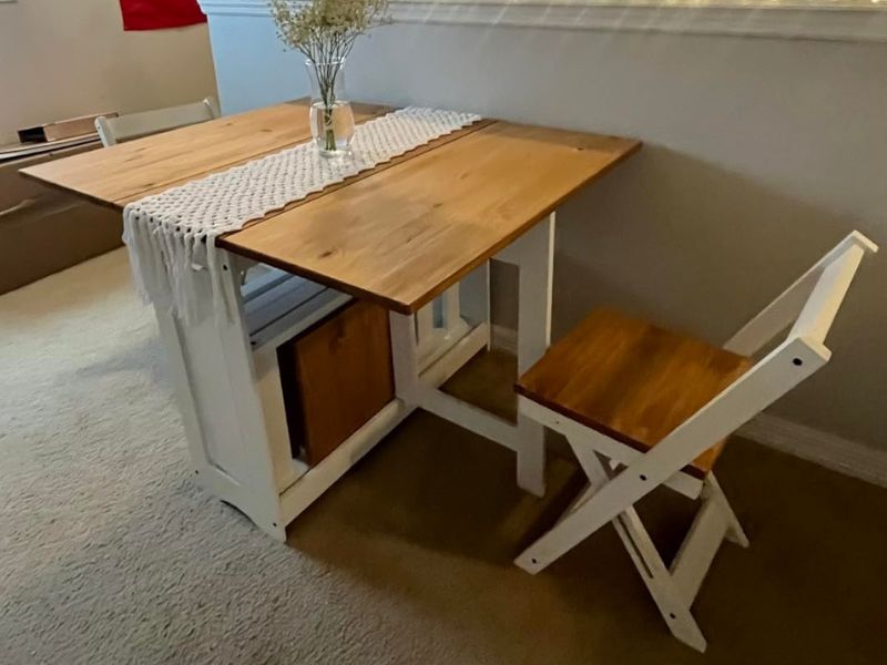 Foto de cliente de Conjunto Mesa y 4 Sillas Plegables Belisim Color Blanco Mate y Roble