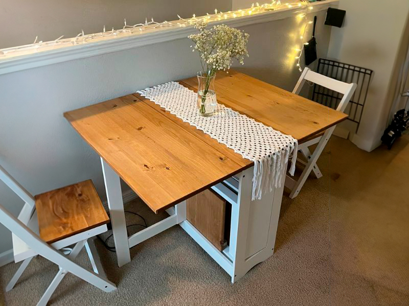 Foto de cliente de Conjunto Mesa y 4 Sillas Plegables Belisim Color Blanco Mate y Roble