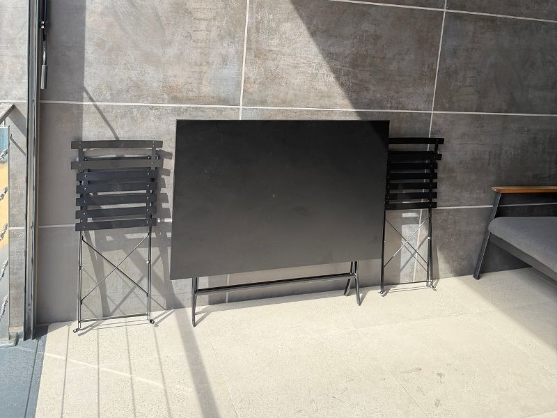 Foto de cliente de Pack Mesa con 4 Sillas Jardín Greensboro Plegables Color Negro