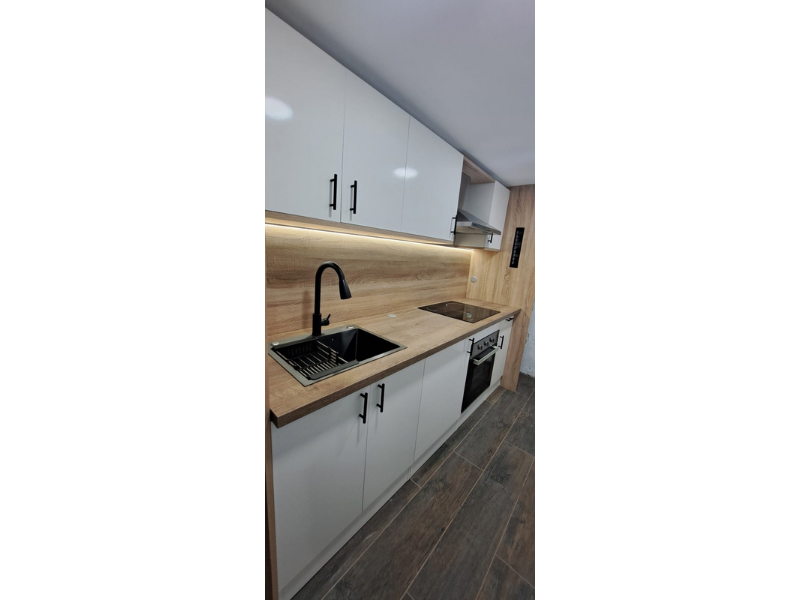 Foto de cliente de Cocina Modular Kira Completa Blanco Brillo y Roble Canadian 240 cm